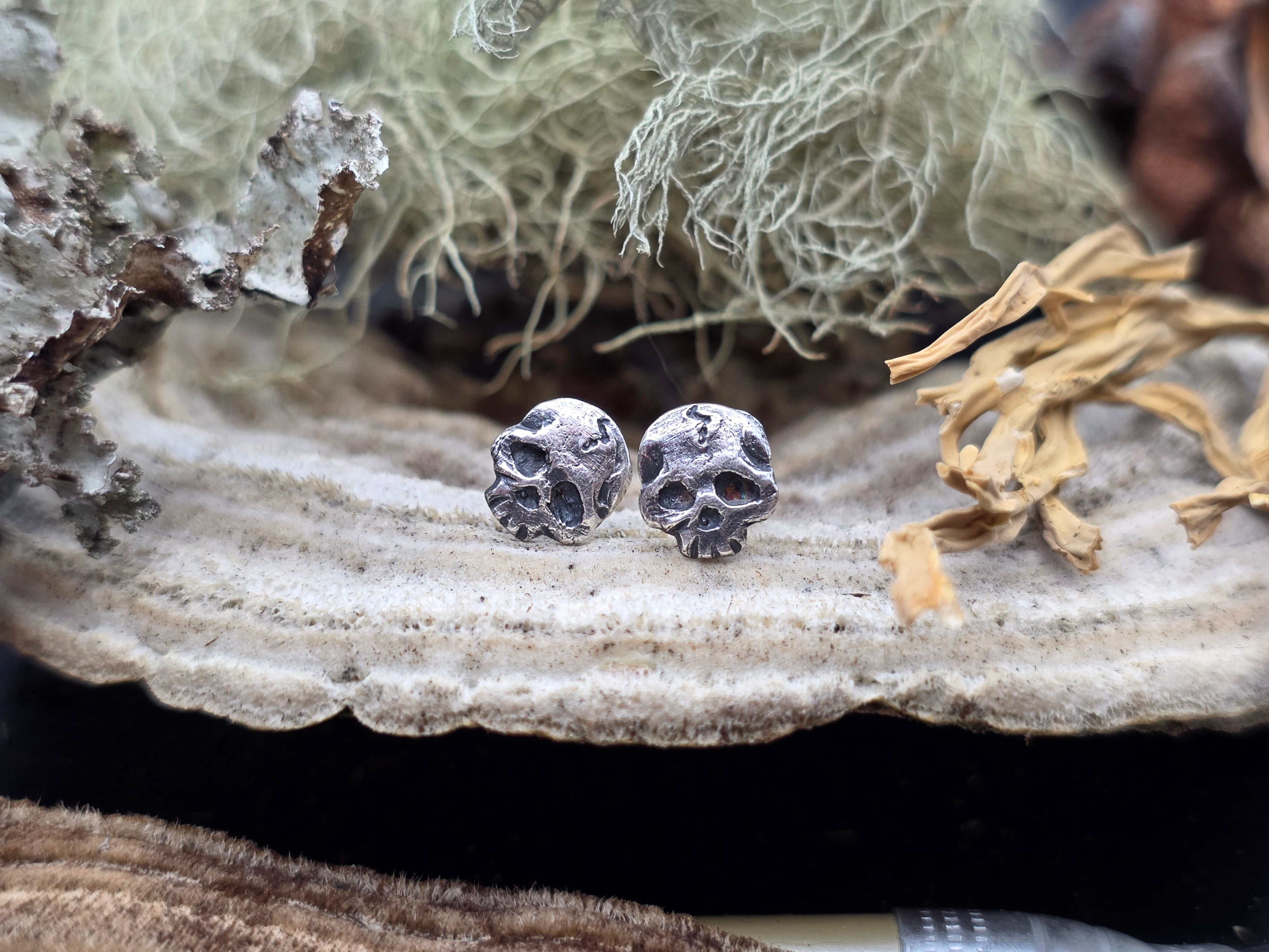 Sterling skull stud earrings