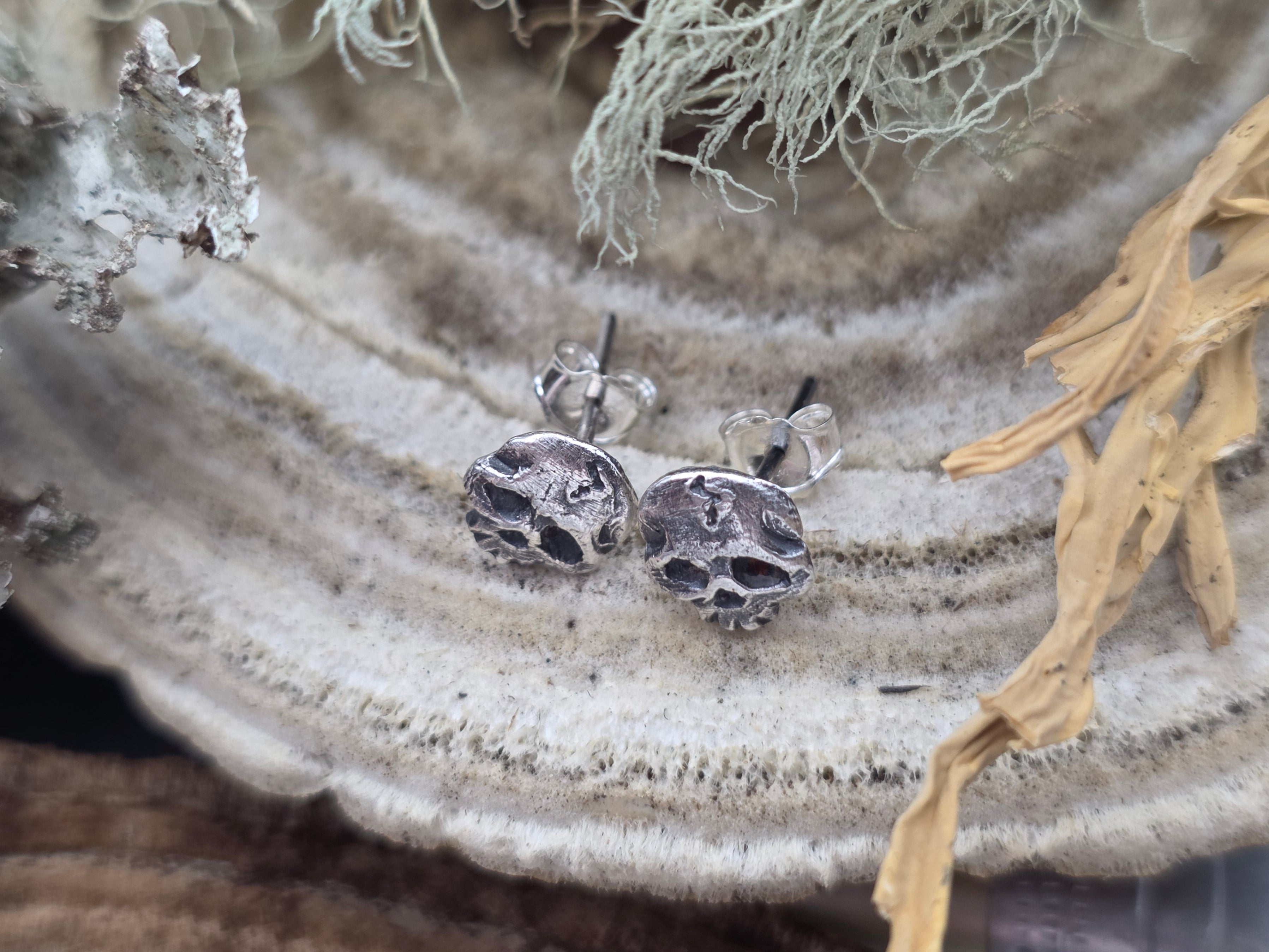 Sterling skull stud earrings